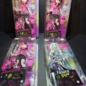Monster High Dolls with Pink and Black Outfits